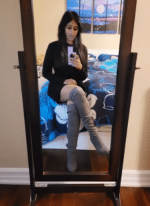 Knee high boots and black sweater dress